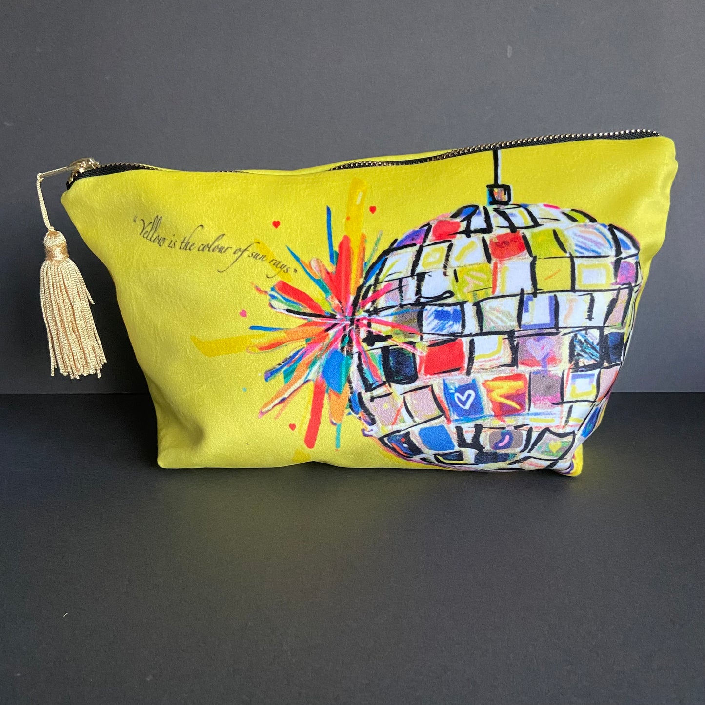 ‘Yellow is the colour of sun rays’ make-up bag