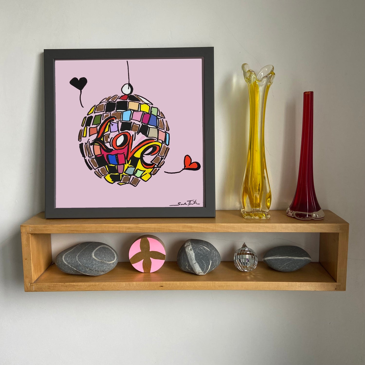 You Got The Love discoball art featuring the word love in red, a cartoon pop art illustration with a pale pink background with two love hearts